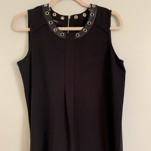 Black blouse with faux leather & grommet neckline